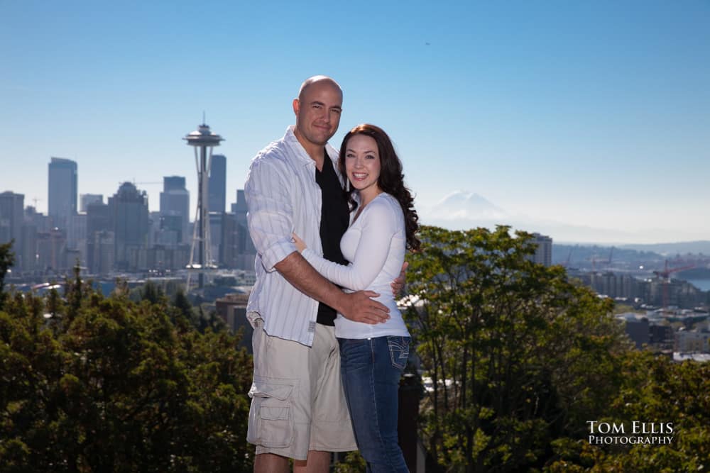 Adriane and Lonnie pose at Kerry Park in Seattle, with the Space Needle and Mt Rainier in the background