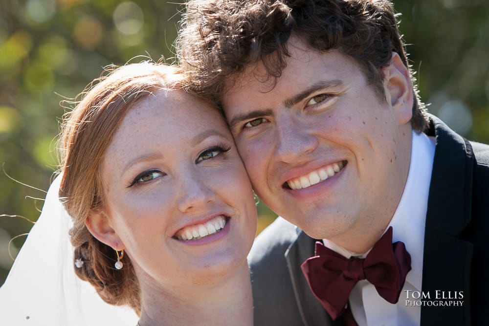 Close up photo of bride and groom at their Golden Gardens wedding by Seattle wedding photographer Tom Ellis Photography