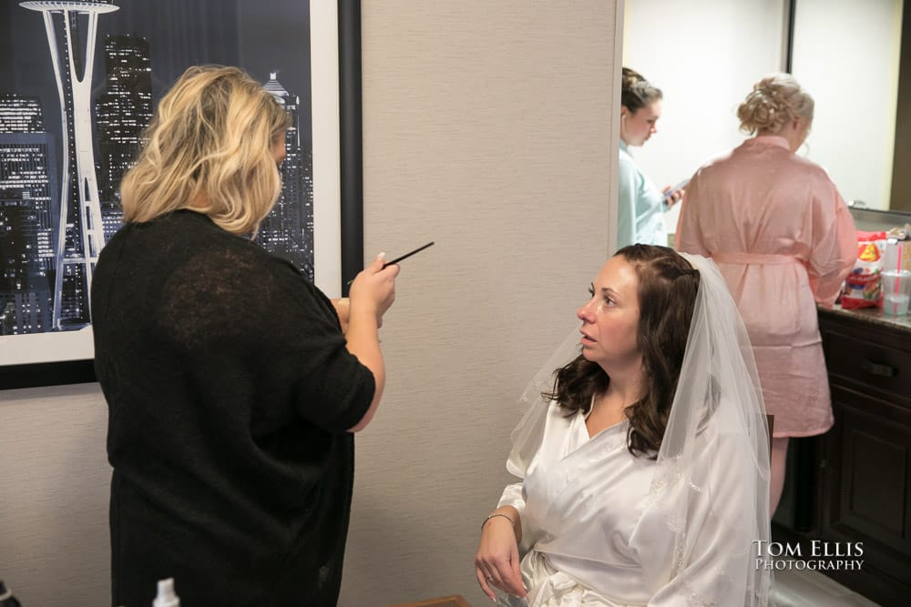Edmonds wedding at Bistro 76 Cafe and Catering - Bride getting her makeup done in her hotel room at the Embassy Suites