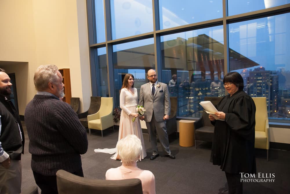 Julia and Matt's wedding ceremony at the Seattle Municipal Courthouse. Tom Ellis Photography, Seattle elopement and courthouse wedding photographer