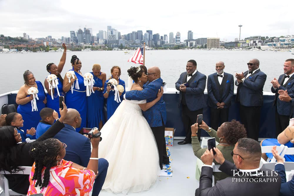 Venita and Mike kiss at the conclusion of their wedding aboard the Emerald Star. Tom Ellis Photography, Seattle wedding photograher