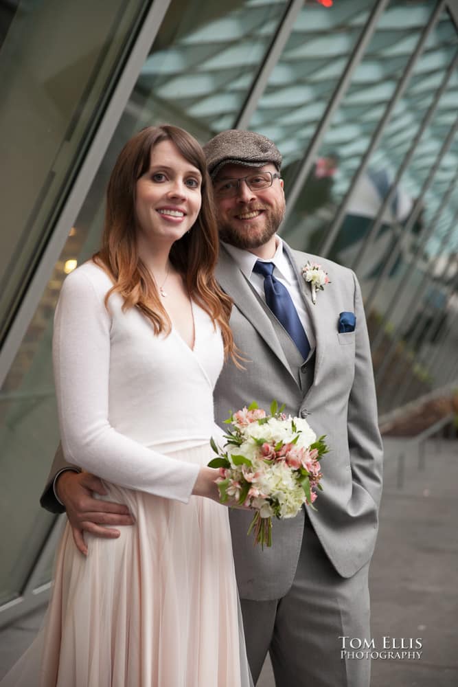 Bride and groom outside the Seattle Public Library